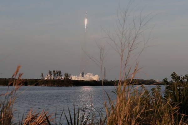 A SpaceX Falcon 9 rocket with a crew of four aboard the Crew Dragon spacecraft lifts off on a mission to the International Space Station from pad 39A at the Kennedy Space Center in Cape Canaveral, Fla., Friday, March 14, 2025. (AP Photo/Terry Renna)