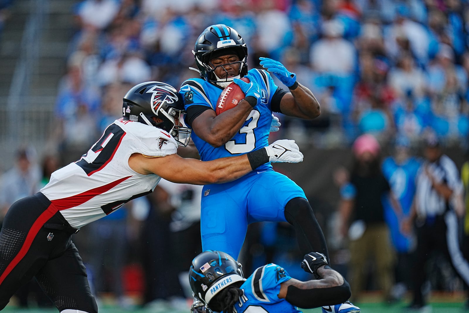 Carolina Panthers running back Raheem Blackshear (3) runs the ball in the first half of an NFL football game against the Atlanta Falcons in Charlotte, N.C., Sunday, Oct. 13, 2024. (AP Photo/Rusty Jones)