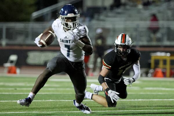 Cedar Grove running back Rashod Dubinion (7) gets past a GAC defender for yardage in the second half at Greater Atlanta Christian, Friday, Oct. 23, 2020, in Norcross. Cedar Grove won 33-6. (Jason Getz/For the AJC)