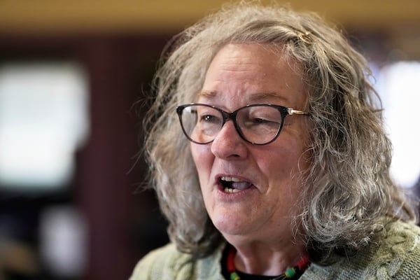 Tracy Baggot answers a question during a town hall meeting at the George Culver Community Library Thursday, March 6, 2025, in Sauk City, Wis. (AP Photo/Morry Gash)