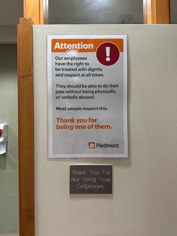 Piedmont Hospital utilizes signage to remind patrons that employees deserve to be able to do their jobs without being verbally or physically abused. Image credit: Nedra Rhone/nrhone@ajc.com