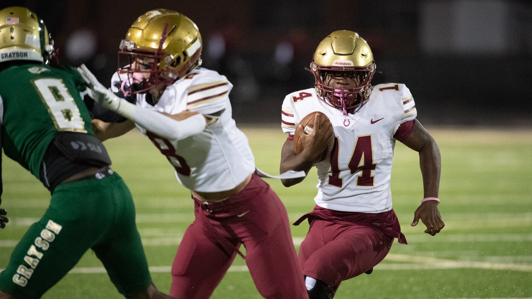 Cameron French, running back for Brookwood, gains some yardage against Grayson. (Jamie Spaar for the Atlanta Journal Constitution)