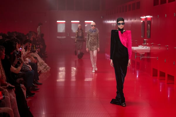 Models wear creations as part of the Valentino Fall/Winter 2025-2026 Womenswear collection presented in Paris, Sunday, March 9, 2025. (Photo by Scott A Garfitt/Invision/AP)