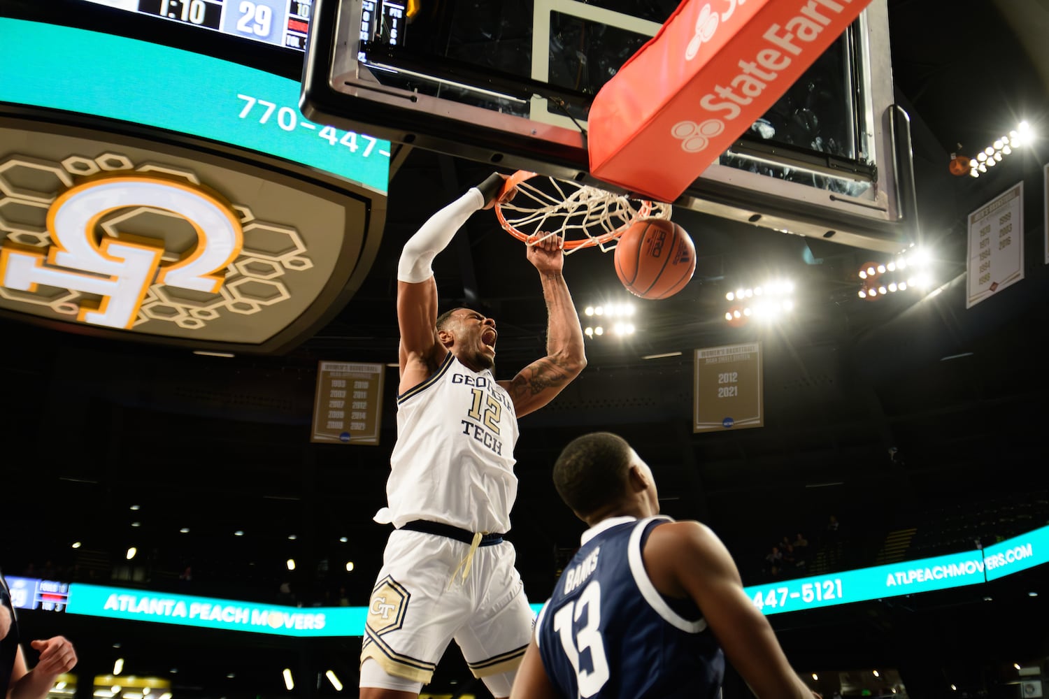 Georgia Tech forward Tyzhaun Claude dunks the ball. (Jamie Spaar for the Atlanta Journal Constitution)