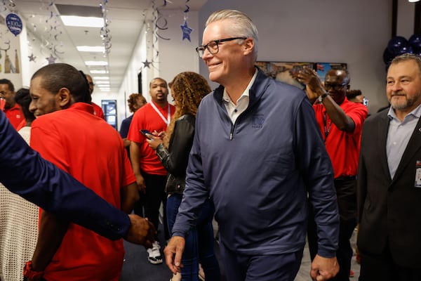 Delta Air Lines CEO Ed Bastian greets employees during the annual profit-sharing day celebration at the Atlanta Customer Engagement Center in Hapeville on Friday, Feb. 14, 2025. (Natrice Miller/AJC)