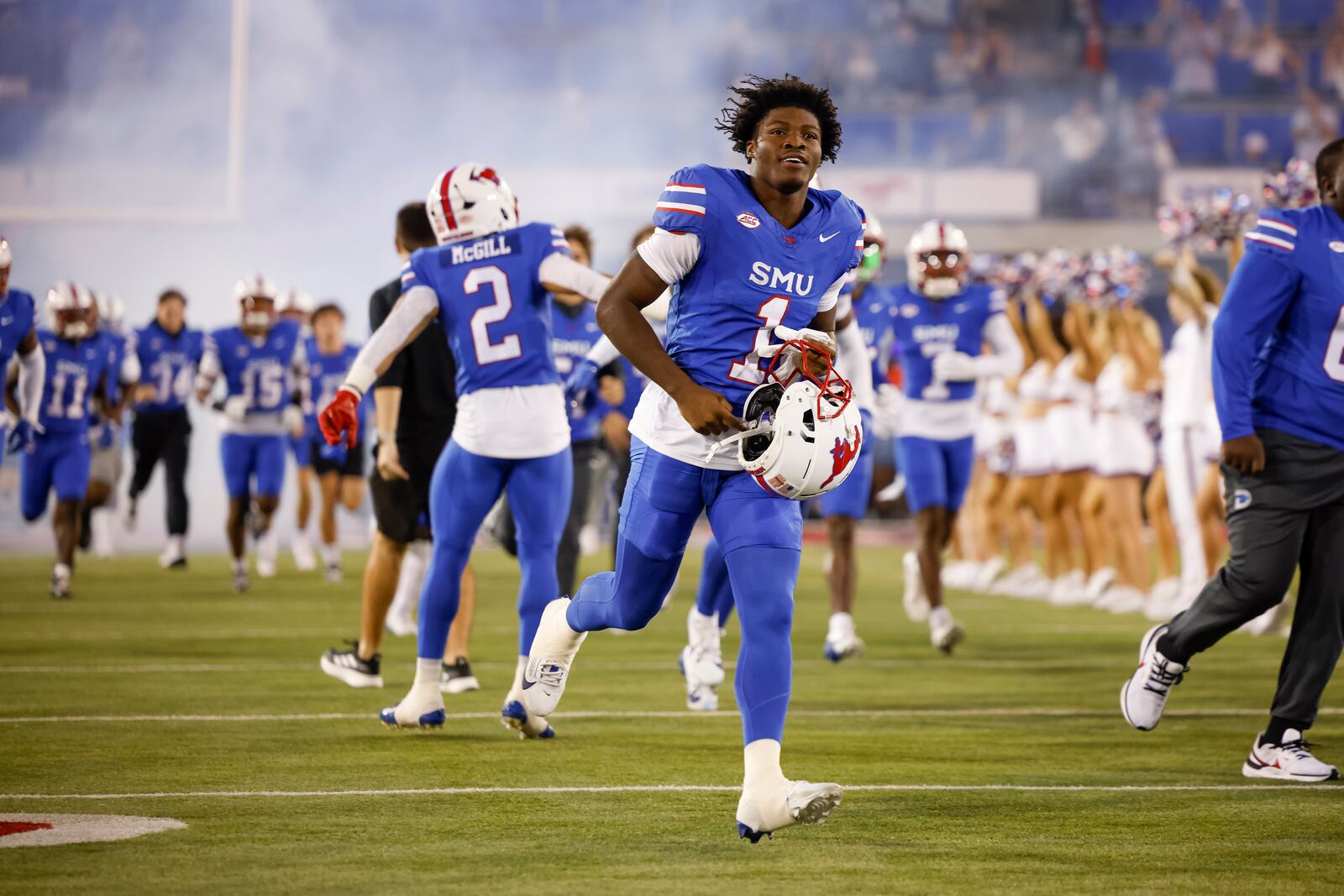 SMU running back Brashard Smith (1) runs onto the field before an NCAA college football game against Pittsburgh in Dallas, Saturday, Nov. 2, 2024. (AP Photo/Gareth Patterson)