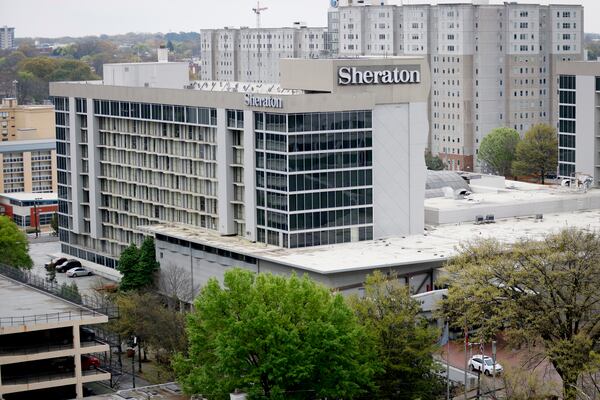 Joining a growing list of downtown properties under financial duress, the Sheraton Atlanta Hotel, with its 763 rooms, is facing the likelihood of foreclosure because of mounting debts by its owner,  Arden Group.
Miguel Martinez /miguel.martinezjimenez@ajc.com