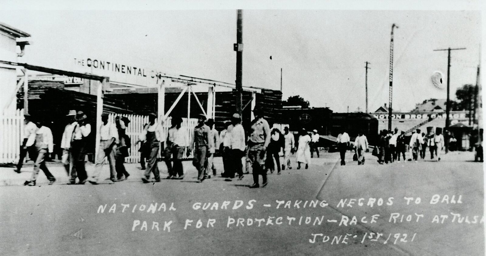 The Oklahoma National Guard takes African-American residents to a ballpark for protection. CONTRIBUTED BY GREENWOOD CULTURAL CENTER