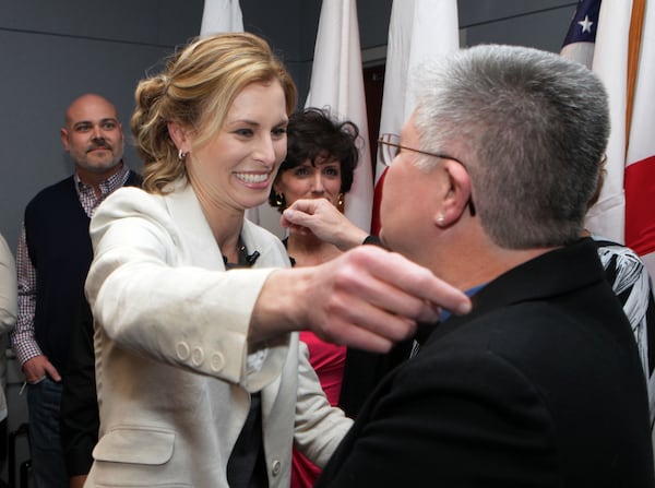 In this file photo from 2013, Supermodel Niki Taylor (left) hugs Susan Jackson as she met some of the blood donors that helped save her life after 2001 car accident during a luncheon at the American Red Cross offices in Atlanta.