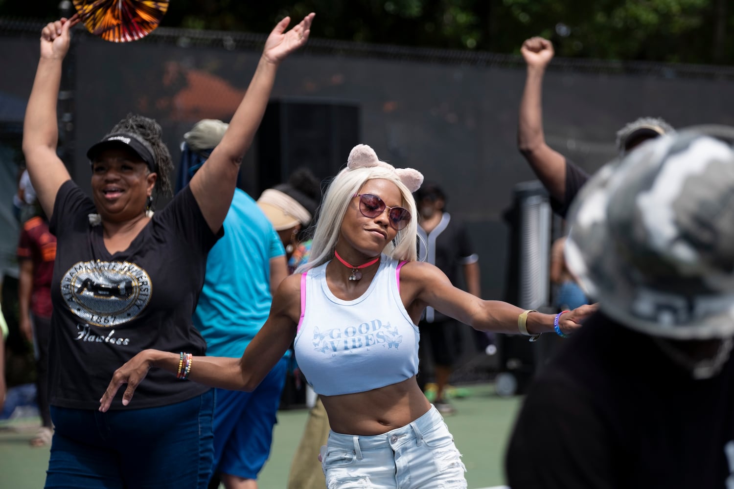 Stacey Smith dances to DJ Kemit during the 20th anniversary of the House In The Park music festival in Grant Park in Atlanta on Sunday, Sept. 1, 2024. (Ben Gray / Ben@BenGray.com)