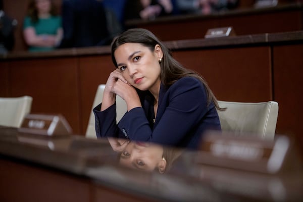 Rep. Alexandria Ocasio-Cortez, D-N.Y., listens to the testimony of the witnesses during a House Committee on Oversight and Government Reform hearing with Sanctuary City Mayors on Capitol Hill, Wednesday, March 5, 2025, in Washington. (AP Photo/Rod Lamkey, Jr.)