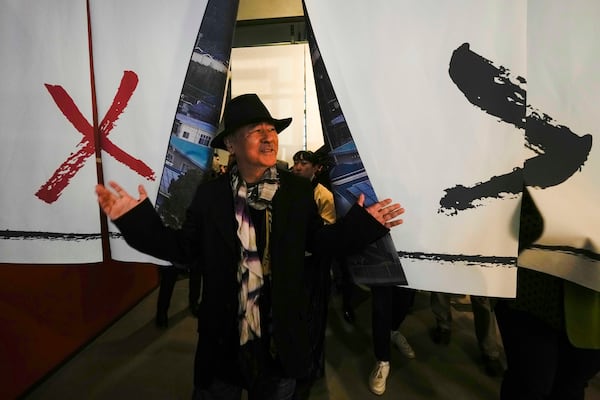 Artist Yoshitaka Amano attends the press preview of the exhibition "Amano Corpus Animae", celebrating his 50-year-long career, at the Fabbrica del Vapore, in Milan, Italy, Tuesday, Nov. 12, 2024. (AP Photo/Luca Bruno)