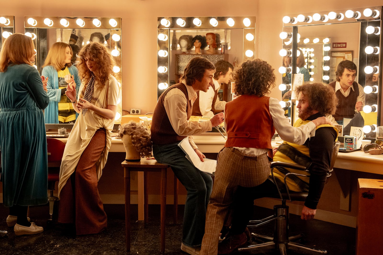 This image released by Sony Pictures shows, from left, Kim Matula, as Jane Curtain, Emily Fairn, as Laraine Newman, Gabriel La Belle, as Lorne Michaels, Rachel Sennott, as Rosie Shuster, and Matt Wood, as John Belushi in a scene from "Saturday Night." (Hopper Stone/Sony Pictures via AP)