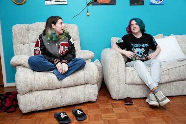 Zoe Reiland, 17, left, and her brother Anakin Reiland, 15, photographed in Clinton, Miss., Monday, March 10, 2025, discuss being monitored at their previous schools, in Oklahoma, by surveillance technology. (AP Photo/Rogelio V. Solis)