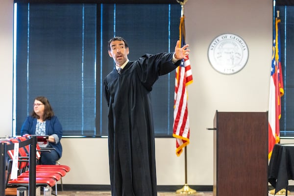 Judge Robert McBurney speaks to potential grand jurors in the jury assembly room at Fulton County Courthouse in Atlanta on Tuesday, July 11, 2023. Two Fulton County grand juries are being selected, one of which will be expected to decide whether to hand up an indictment in the long-running investigation into alleged meddling with the 2020 presidential election. (Arvin Temkar / arvin.temkar@ajc.com)