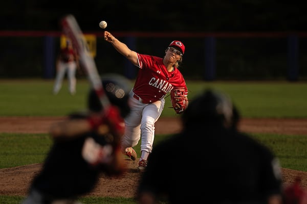 Allison Schroder #16 of Team Canada pitches during a WBSC Women's Baseball World Cup exhibition game against Team USA at Baseball Central on Friday, July 26, 2024 in Thunder Bay, Ontario. (Jean Fruth via AP)