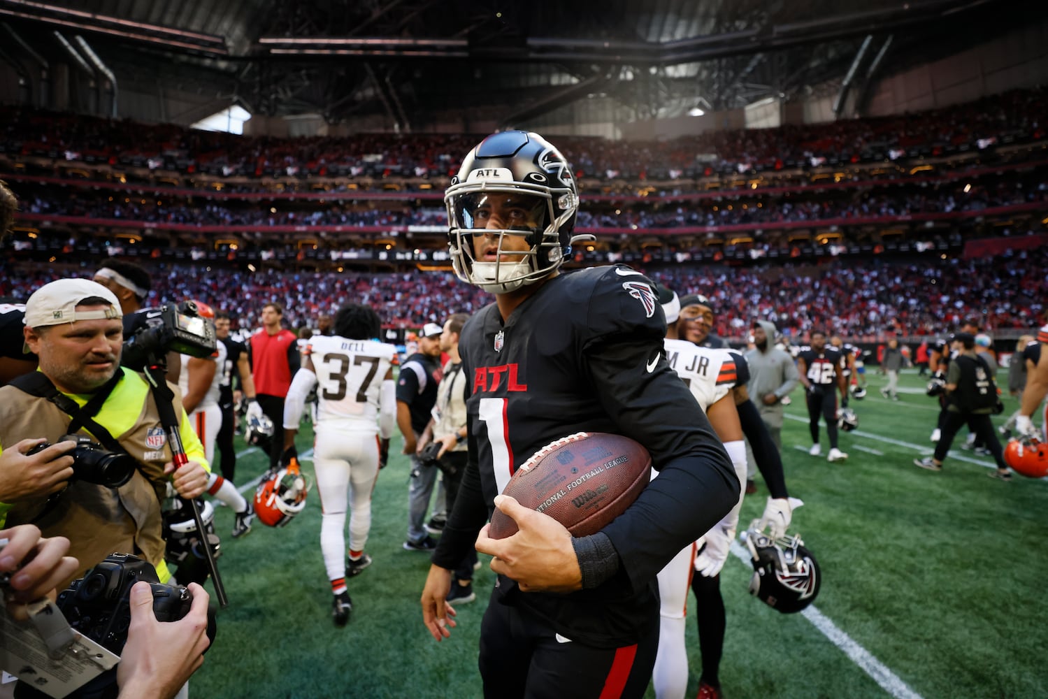 Falcons quarterback Marcus Mariota walks off the field after Atlanta defeated the Browns 23-20 on Sunday. (Miguel Martinez / miguel.martinezjimenez@ajc.com)