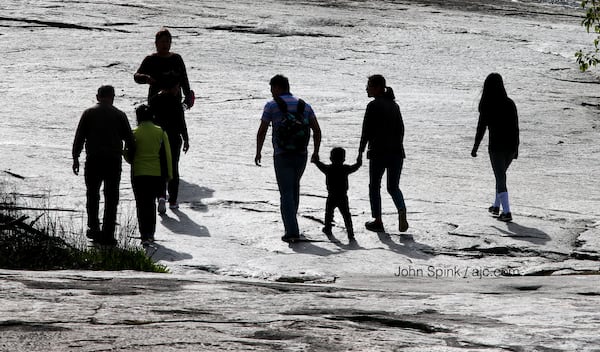 Visitors enjoy walking up Stone Mountain on a pleasant Wednesday morning. JOHN SPINK / JSPINK@AJC.COM