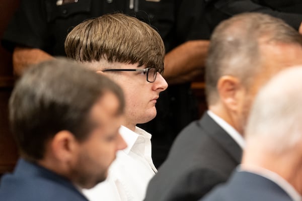 Robert Aaron Long sits in court before pleading guilty.