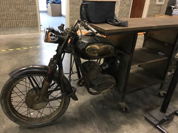 This is definitely one of the more interesting artifacts: an old motorcycle turned into a bar. Robert Ahlers, who is running the sale, said that is probably the priciest item available at $2,495. 