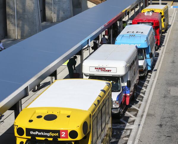 Aug 12, 2019 Hartsfield-Jackson International Airport : The worldâ€™s busiest airport moved off-airport parking shuttle pick-ups at the domestic terminal to the Terminal North lower level on Monday Aug. 12. Previously, those shuttles line up in designated spaces along an aisle of the ground transportation center outside the airportâ€™s west exit door. But there are major construction projects planned in that area, include an extension of the Plane Train tunnel and improvements to the West curb area. Monday, airport officials advised passengers taking off-airport parking shuttles to go to Terminal North escalators down to the lower level and exit through door LN1. Airport officials say signs and customer service representatives in bright green jackets will direct passengers. There will be no change for shuttle drop-offs, which will continue to be at the outer curb on the upper level of Terminal North. Regional shared-ride shuttle pick-ups will also be relocated effective Monday Aug. 12. The regional shared-ride shuttle pick-up area will take the place of the off-airport parking shuttles, behind the hotel shuttle aisle. Airport officials plan to later announce more changes for shuttle locations this fall. JOHN SPINK/JSPINK@AJC.COM