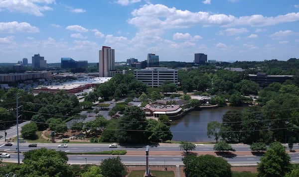 Developer plans to build a mixed-use shopping center in this space. The plan involves paving over a pond. HYOSUB SHIN / HSHIN@AJC.COM