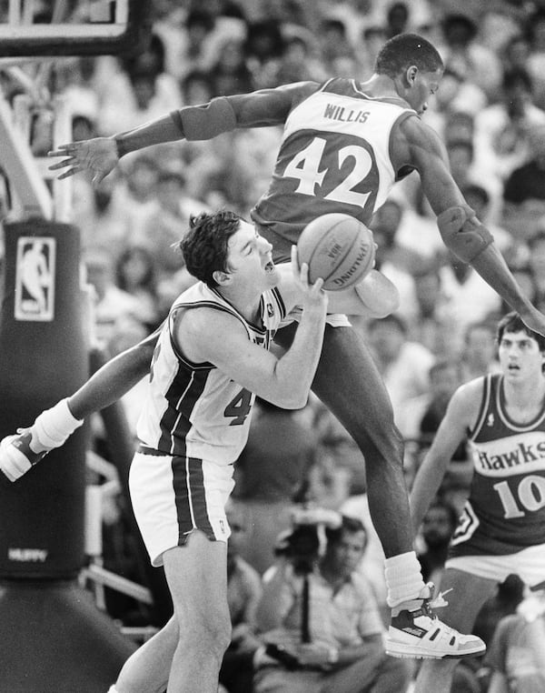 Kevin Willis of the Hawks fouls Bill Laimbeer during a playoff game in 1987. Rich Addicks / AJC file photo