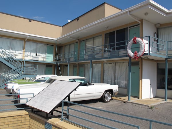 This March 19, 2014 photo shows a wreath marking the spot on the balcony where Martin Luther King Jr. was fatally shot on April 4, 1968 at the old Lorraine Motel in Memphis, Tenn. The motel has since been turned into the National Civil Rights Museum, which has undergone months of renovations. The museum, which first opened in 1991, is now ready to show off new, emotionally-moving exhibits and flashy, informative interactive displays. The museum says it attracts 200,000 people every year, but the renovations are impressive enough that they could lead to a spike in visitor turnout. (AP Photo/Adrian Sainz).