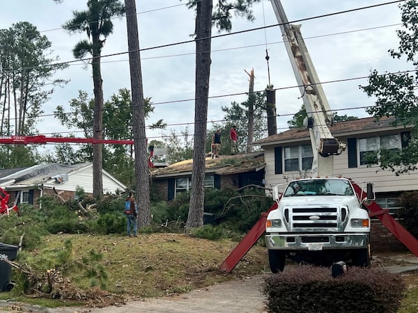 Crews work on a house in west Augusta on October 1, 2024 following Hurricane Helene. (Photo Courtesy of Charmain Z. Brackett/Augusta Good News)