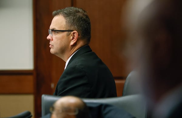 Court of Appeals Judge Christian Coomer sits in a court room at Cobb County Superior Court on day one of his trial for alleged ethic violations on Monday, October 17, 2022. (Natrice Miller/natrice.miller@ajc.com)  


