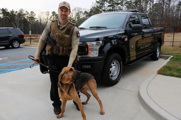 Gus and his handler, Jeremy Pritchett.