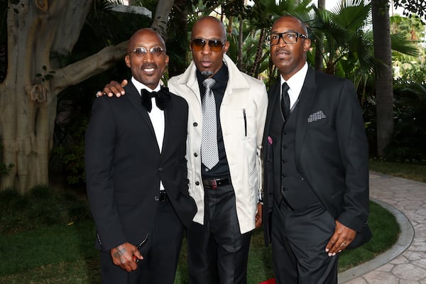 FILE - D'Wayne Wiggins, from left, Raphael Saadiq and Amar Khalil, of the R&B group Tony! Toni! Toné!, appear at the 26th Annual Heroes and Legends Awards in Beverly Hills, Calif., on Sept. 27, 2015. (Photo by John Salangsang/Invision/AP, File)