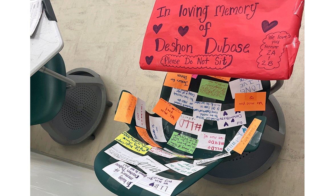 The desk of Deshon DuBose was covered with notes by fellow students. / Courtesy of Laurin McClung