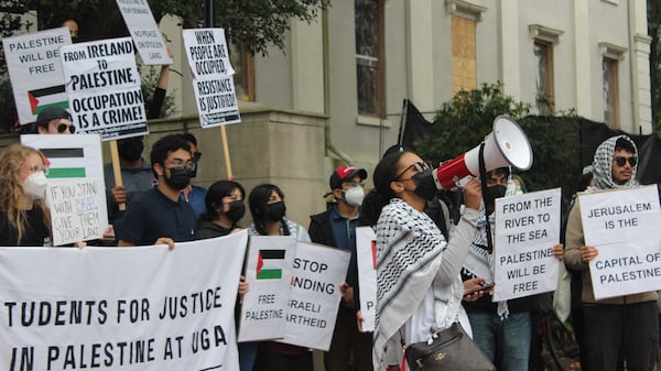 A group of University of Georgia students voiced solidarity for Palestinians who were unable to leave Gaza and faced heavy bombing just days after the start of the Israel-Hamas war last October. 