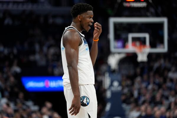 Timberwolves guard Anthony Edwards reacts after being called for a foul against the Hawks.