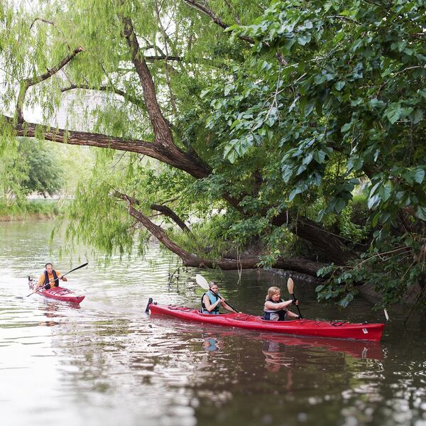 Kayakers enjoy Buffalo Bayou Park, a linear green space surrounding the bayou that runs right through downtown Houston. CONTRIBUTED BY JEREMY KEAS