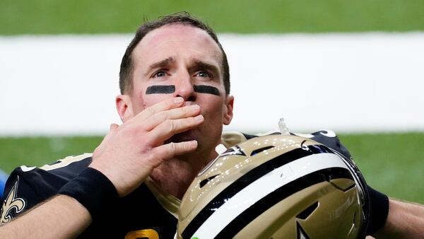 New Orleans Saints quarterback Drew Brees waves to his family and fans after the 30-20 divisional round playoff football loss to the Tampa Bay Buccaneers, Sunday, Jan. 17, 2021, in New Orleans. It is expected Brees, 42, will retire. (Brynn Anderson/AP)