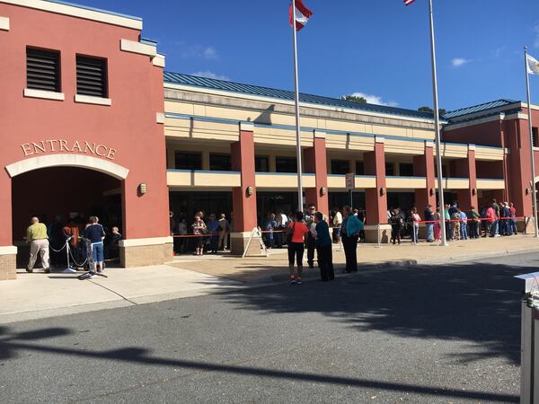 Dozens of Cobb County residents wait outside the county's elections office the first day of early voting, Oct. 17, 2016. Some waited an hour. Ben Brasch/The Atlanta Journal-Constitution