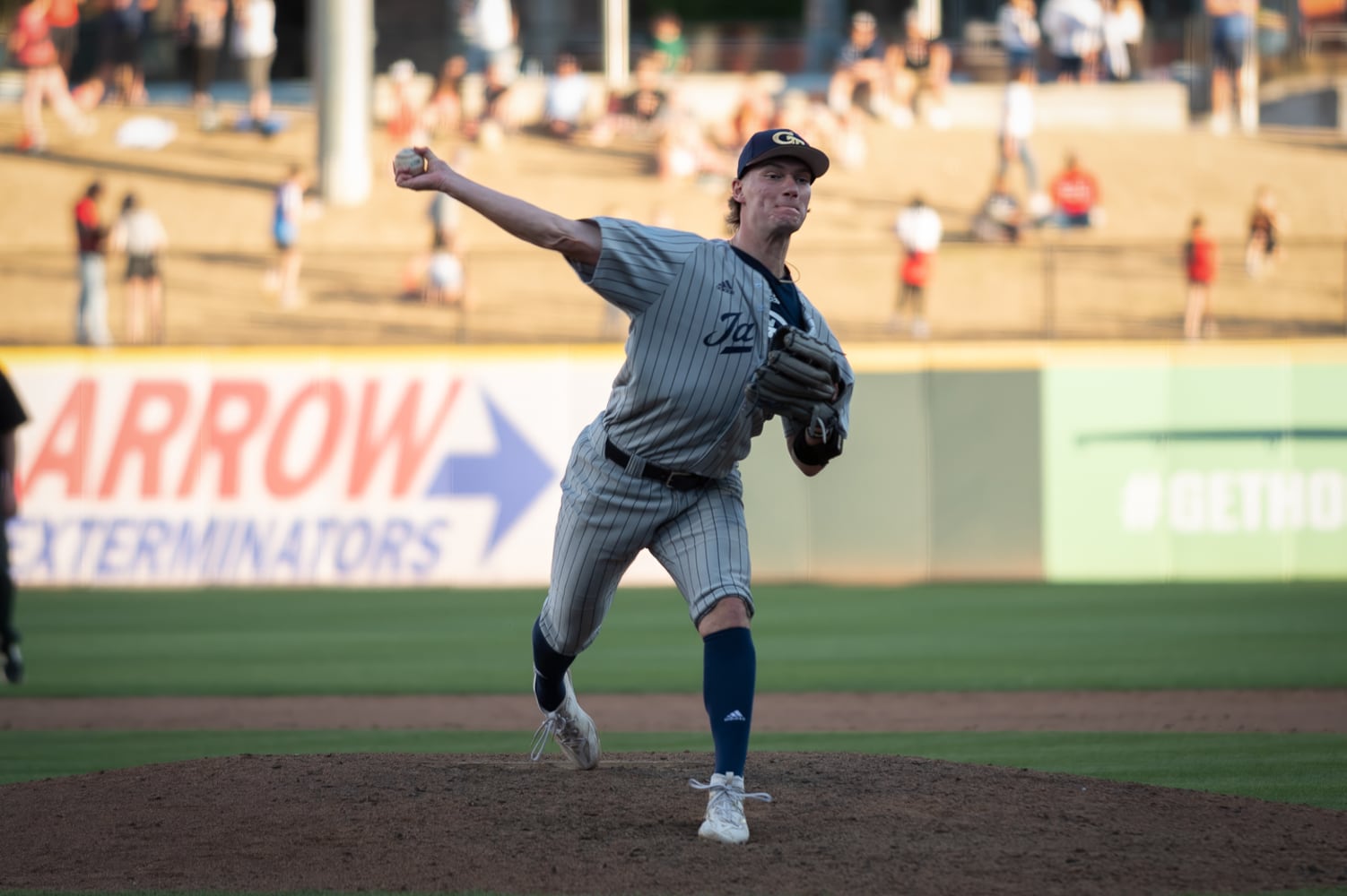 Georgia Tech pitcher Terry Busse warms up during the 20th Spring Classic game against Georgia on Sunday at Coolray Field in Lawrenceville. (Jamie Spaar / for The Atlanta Journal-Constitution)