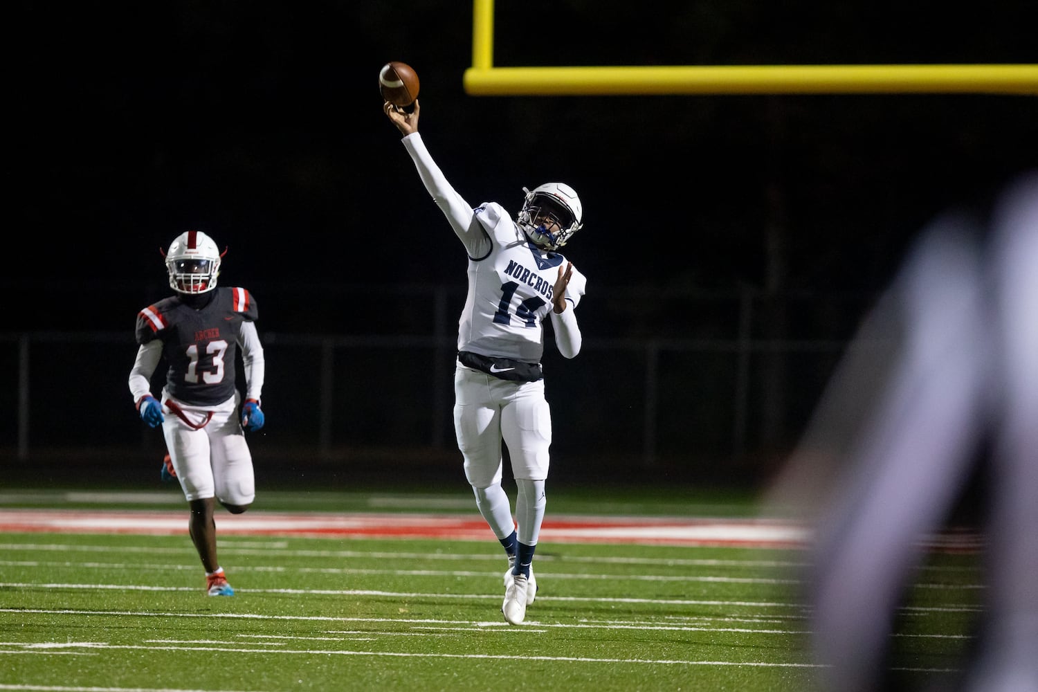 Norcross quarterback Javan Brown Jr. (14) throws the ball at a GHSA high school football game between Archer High School and Norcross High School in Lawrenceville, GA., on Friday, November 5, 2021. (Photo/Jenn Finch)