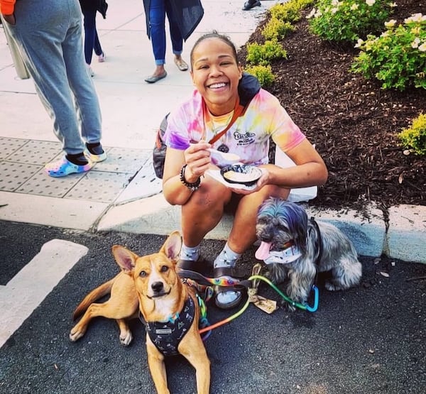 Spa Wags owner Kimberly Hicks with her dogs during Powder Springs' Seafood Festival in May. (Photo provided/Kimberly Hicks)