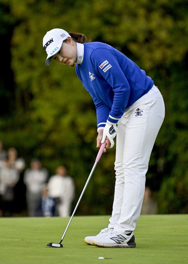 Rio Takeda of Japan makes a put shot in the LPGA's Toto Japan Classic in a playoff at the Seta Golf Course in Otsu, western Japan, Sunday, Nov. 3, 2024. (Keiji Uesho/Kyodo News via AP)