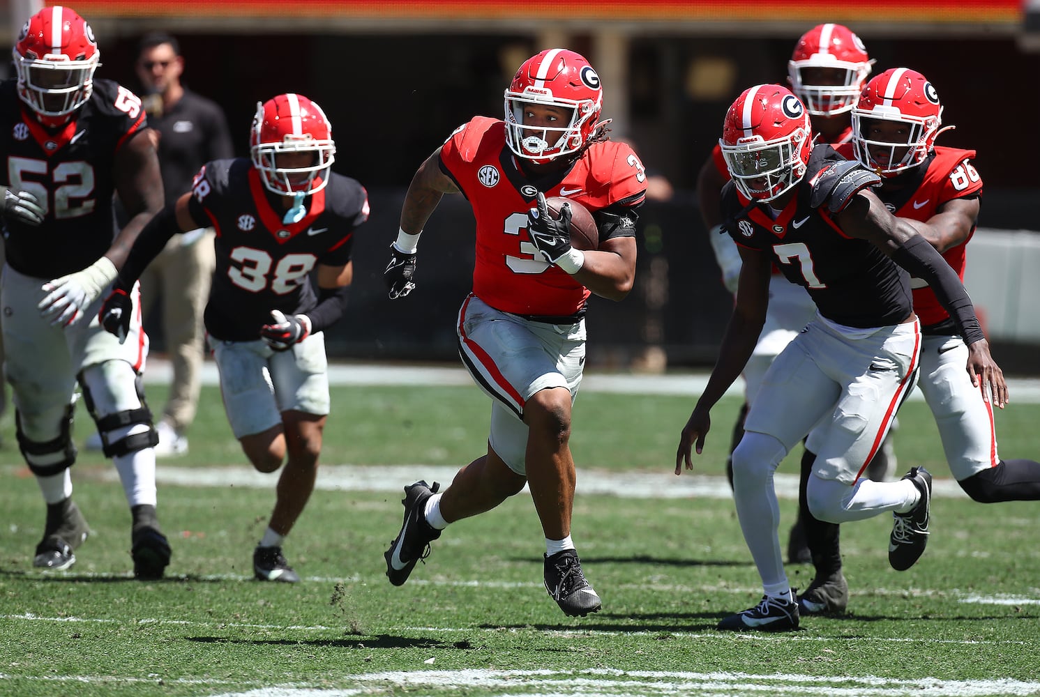 Georgia running back Andrew Paul breaks away for yardage during the G-Day game on Saturday, April 13, 2024.  Curtis Compton for the Atlanta Journal Constitution