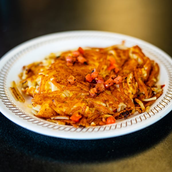 Diced hasbrowns from Waffle House with grilled tomatoes.