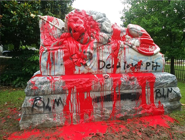 Confederate Lion damaged at Oakland Cemetery (handout)