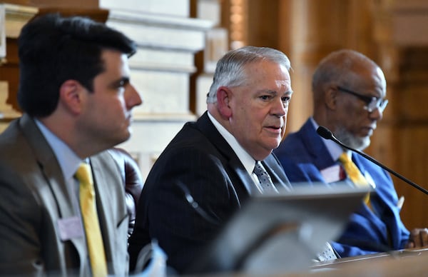 June 23, 2020 Atlanta - Speaker of the House David Ralston (R-Blue Ridge) speaks as Rep. Chuck Efstration (R-Dacula), left, and Rep Calvin Smyre (D-Columbus) sit during a press conference after HB-426 passed in the House Chambers on day 37 of the legislative session at Georgia State Capitol on Tuesday, June 23, 2020. HB-426 passed. The bill Would implement stiffer penalties if those guilty of crimes are found to have been motivated by hate. (Hyosub Shin / Hyosub.Shin@ajc.com)