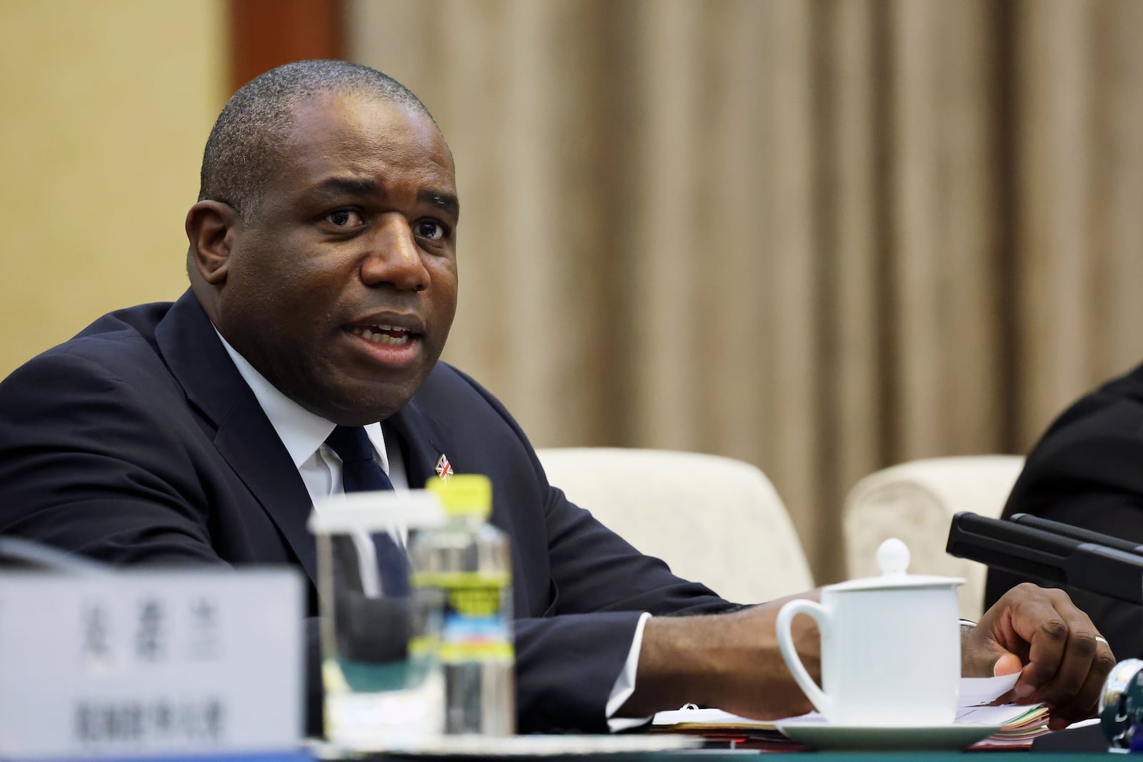 Britain's Foreign Secretary David Lammy attends a meeting with Chinese Vice Premier Ding Xuexiang at the Great Hall of the People in Beijing, China, Friday, Oct. 18, 2024. (Florence Lo/Pool Photos via AP)