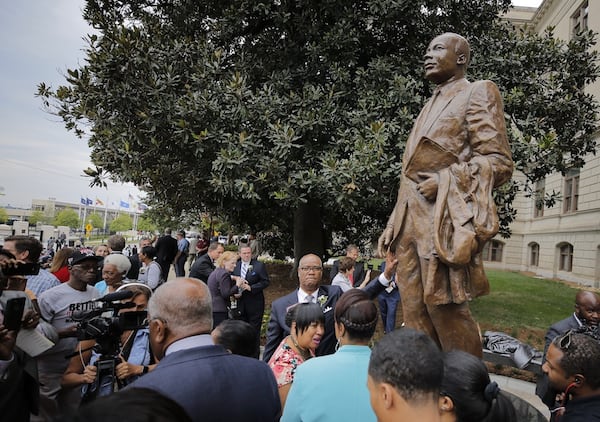 Georgia leaders, including Gov. Nathan Deal, Sandra Deal, and members of the King family, unveiled the first statue of Martin Luther King Jr. on Monday at the statehouse grounds, more than three years after Gov. Nathan Deal first announced the project. During the hour-long ceremony leading to the unveiling of the statue of Martin Luther King Jr. at the state Capitol on Monday, many speakers, including Gov. Nathan Deal, spoke of King’s biography. The statue was unveiled on the anniversary of King’s famed “I Have Dream” speech. 