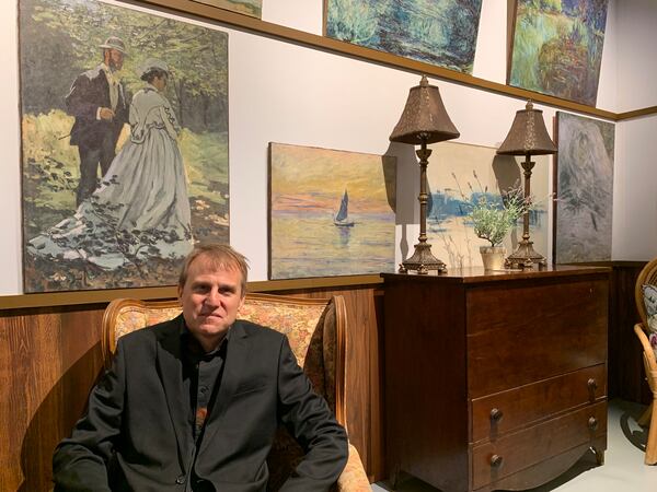 John Zaller, who runs the newly opened Exhibition Hub in Doraville, in the Claude Monet Experience, which opened October 28, 2022. RODNEY HO/rho@ajc.com