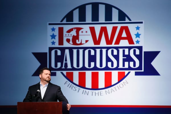 Iowa Democratic Party chairman Troy Price speaks about the delay in Iowa caucus results, Tuesday, Feb. 4, 2020, in Des Moines, Iowa. (AP Photo/Charlie Neibergall)